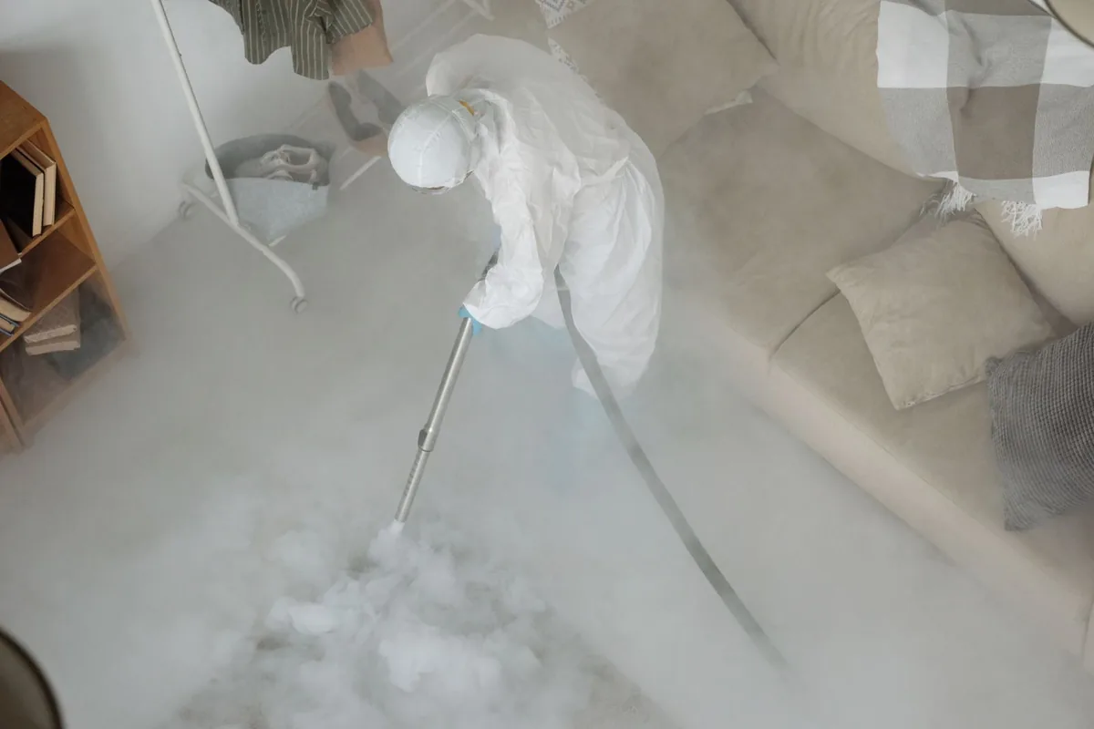 Biohazard cleanup technician in protective equipment, Union City, GA